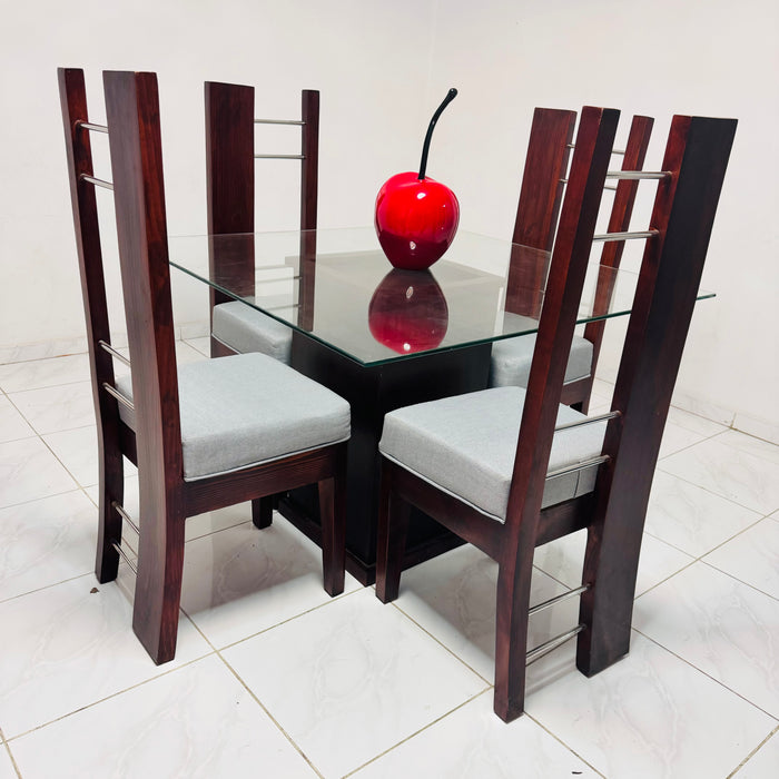Juego de comedor fj 4 silla tope cristal. Madera color caoba asientos tapizados